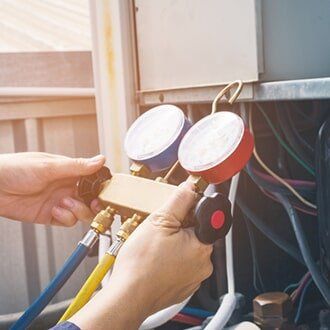 Repairman Checking The AC — Residential Service Specialist Panama City FL in Panama City, FL