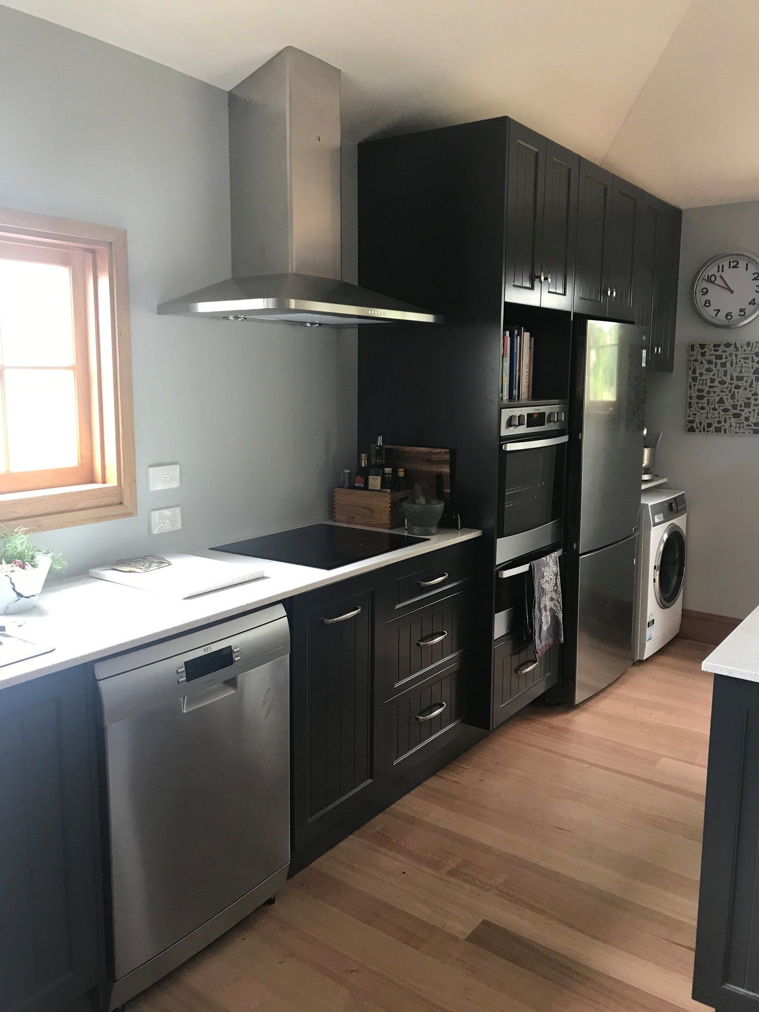 Kitchen Cabinets with Black Appliances — Glenorchy, TAS — WD Bryan Joinery House