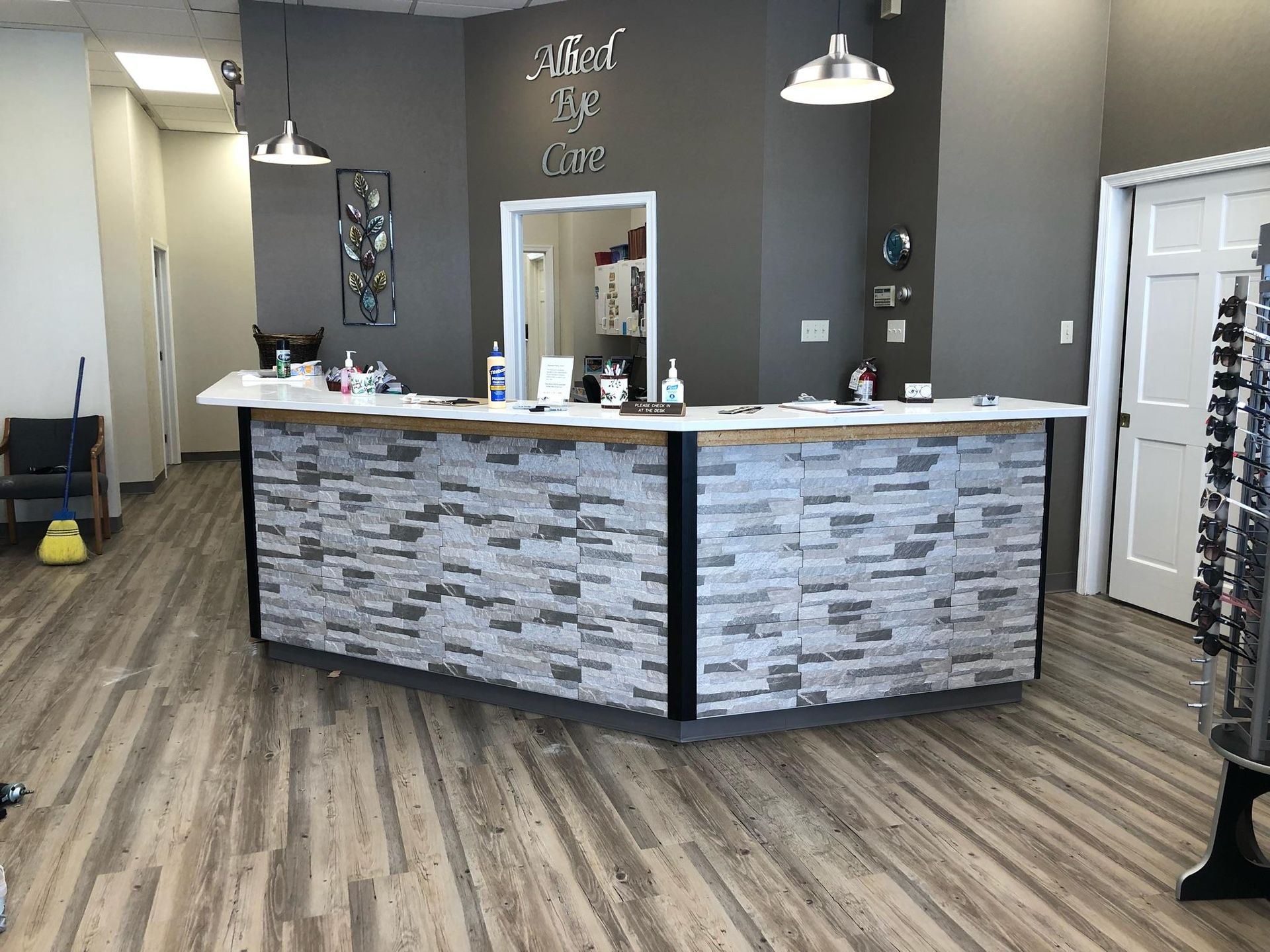 There is a brick counter in the middle of the room.