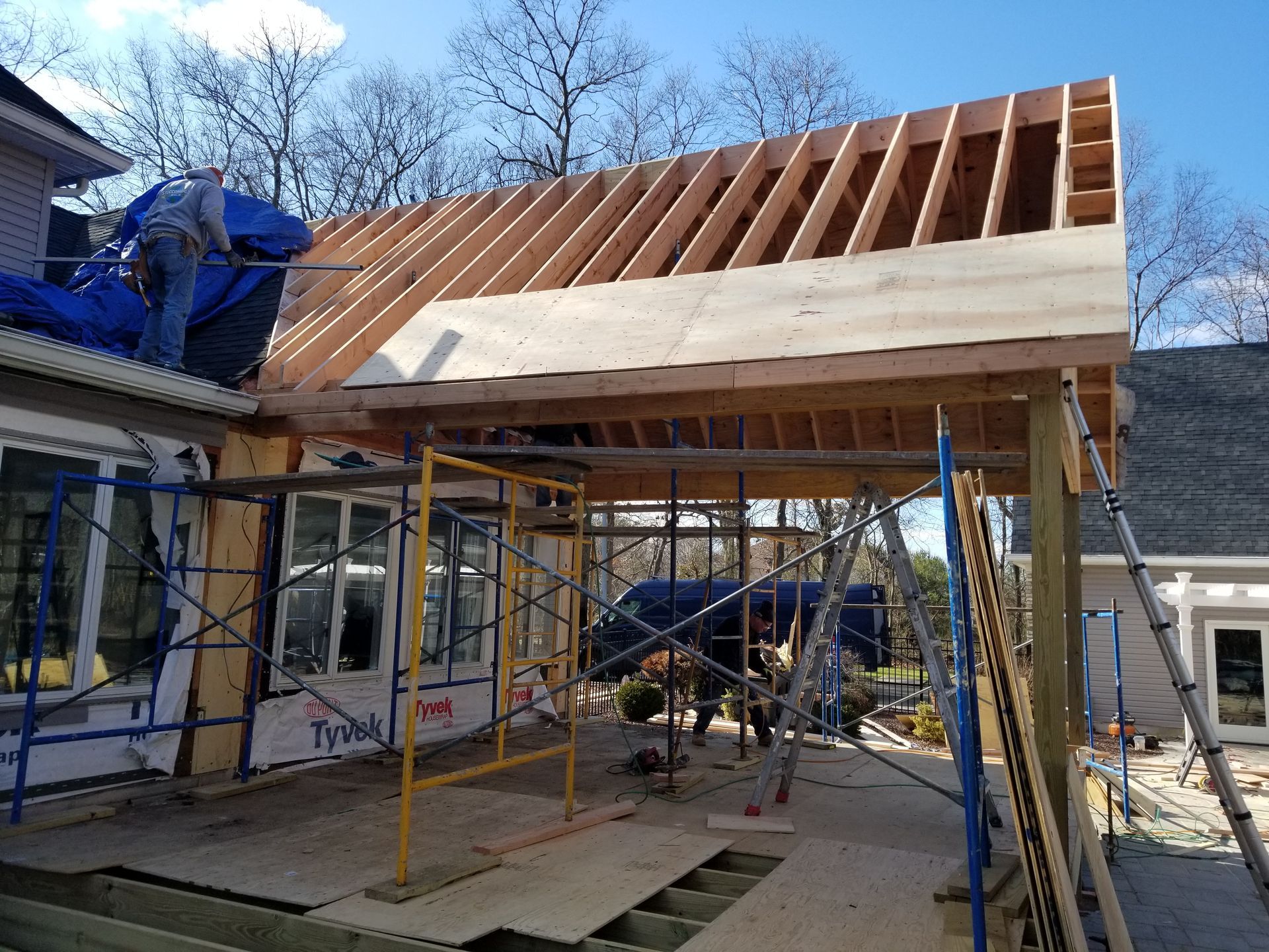 A roof is being built on top of a house