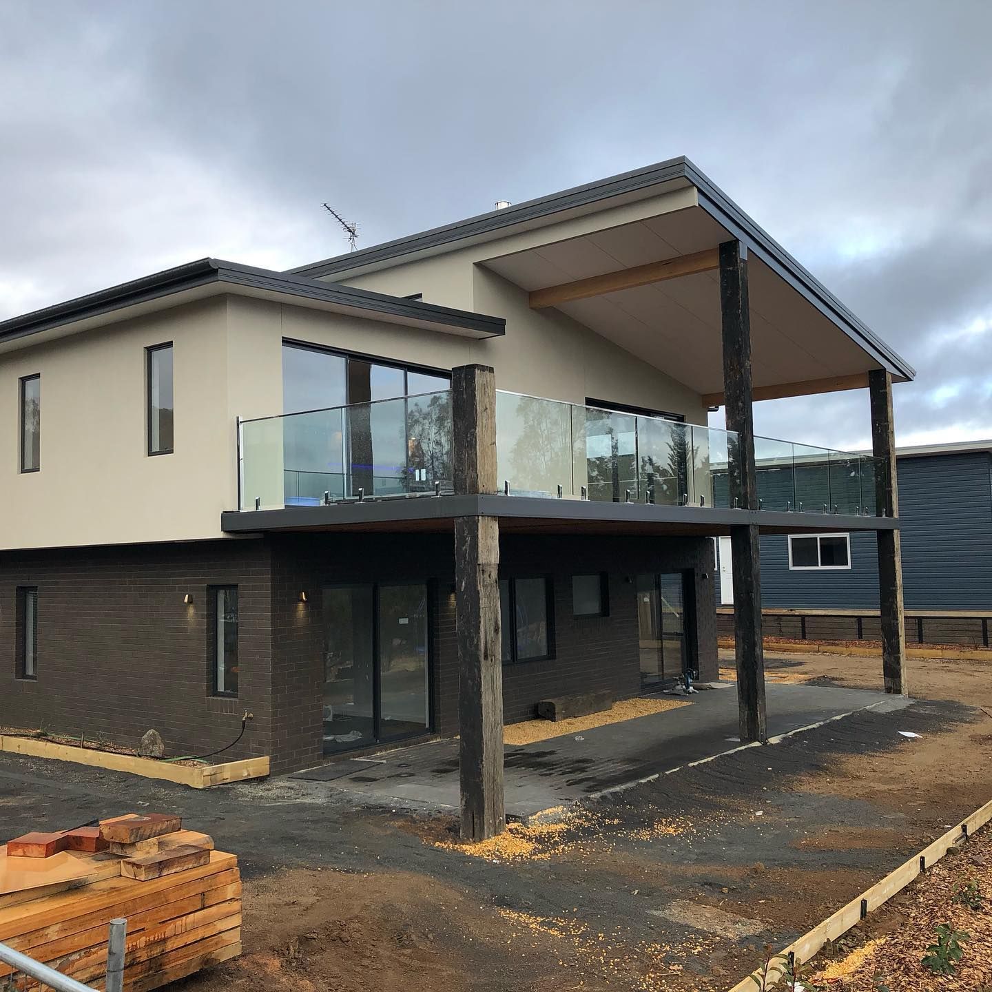 A large house with a balcony and a lot of windows