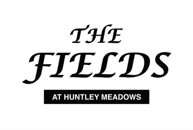 A black and white logo for the fields at huntley meadows.