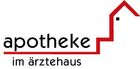 Ein Logo für eine Apotheke mit einem roten Haus darauf