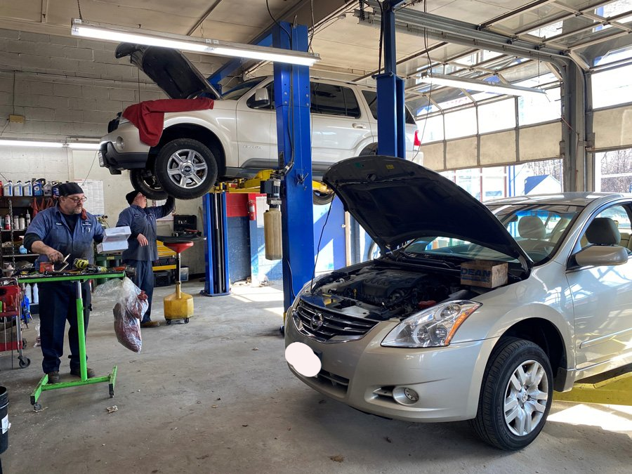 Men In Auto Garage — Worcester County MA — Globe Transmission