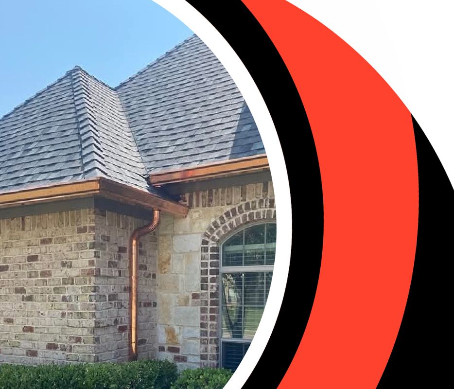 A picture of a brick house with a copper gutter