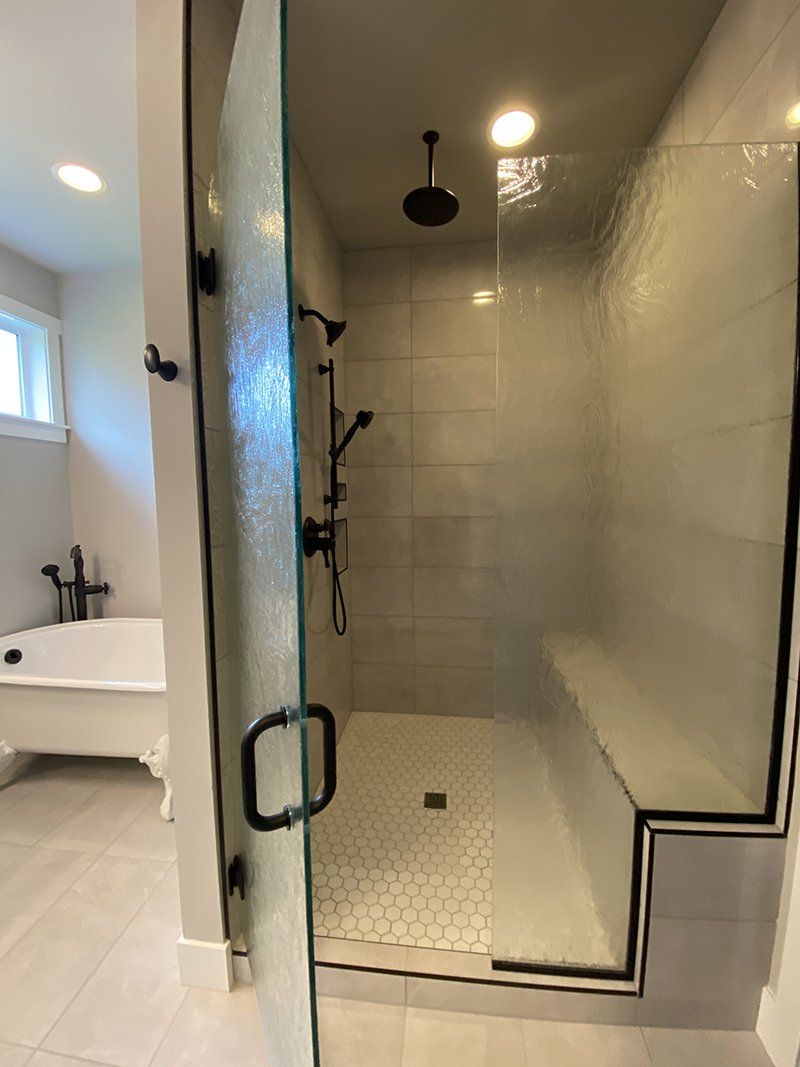 Bathroom and Bathtub — Sunny Outside Front View House in Marysville, WA