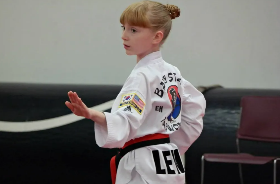 A young student in a TKD