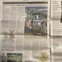 Newspaper article featuring Rose Tree Service with two men in front of a truck and an advertisement for Milton Park Church of God.