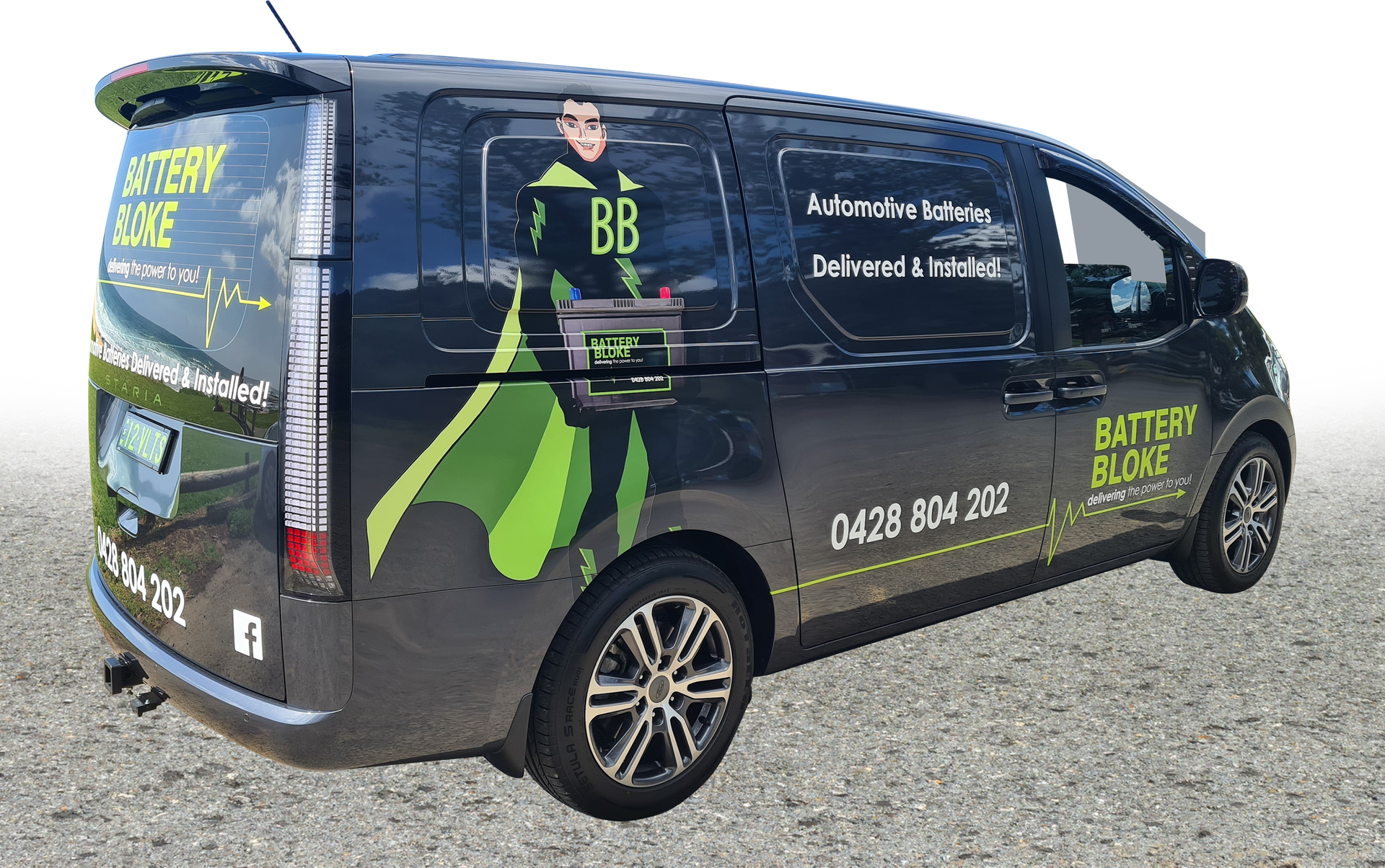 A black car that says battery bloke proudly servicing the Illawarra