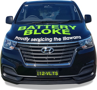 A black car that says battery bloke proudly servicing the illawarra