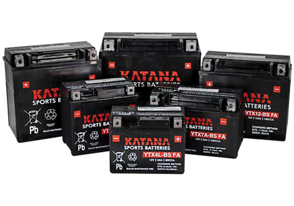 A group of katana batteries are sitting on top of each other on a white surface.