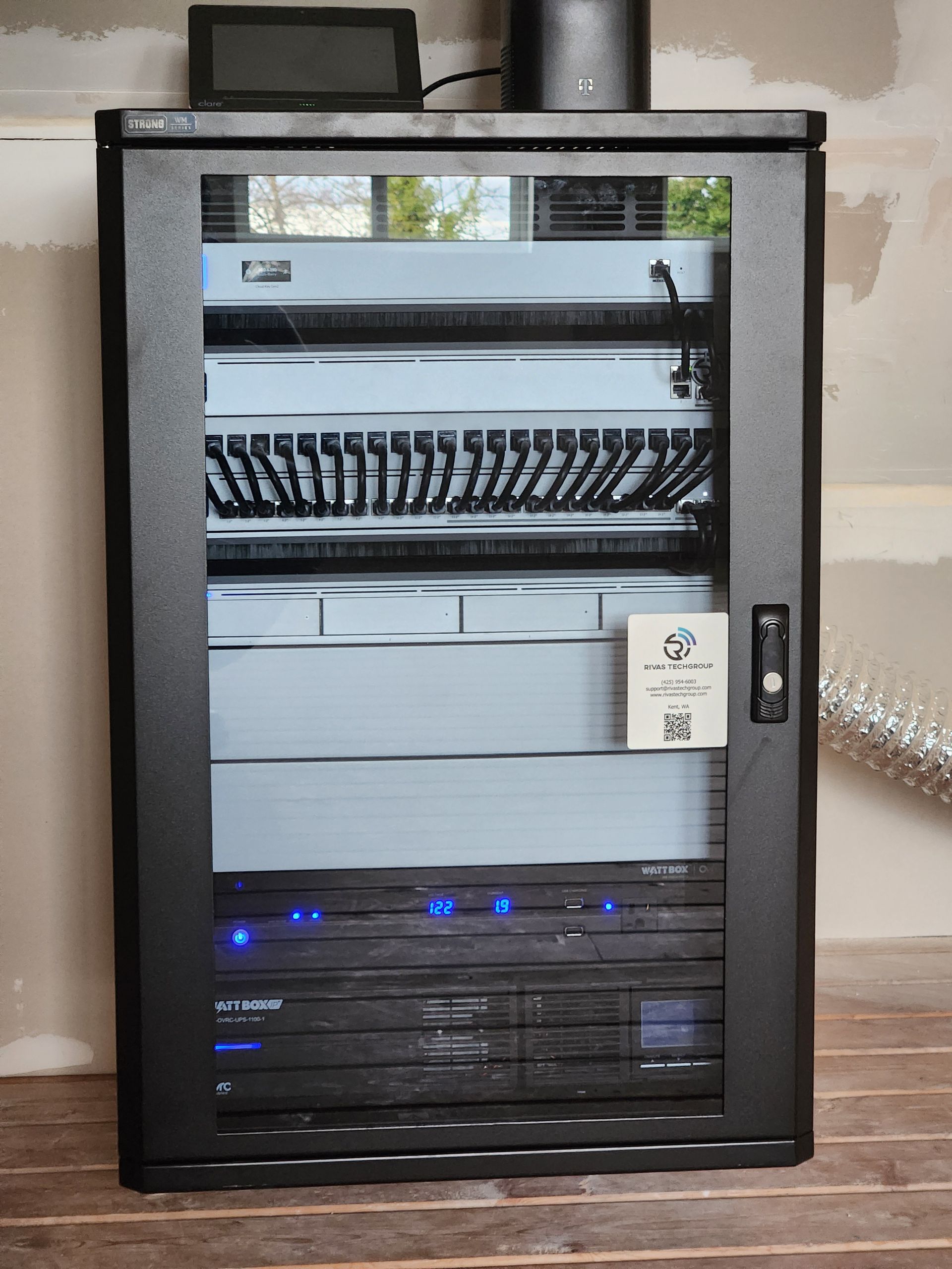 Estate equipment rack with managed networking, Luma NVR, and WattBox power installed by Rivas Technology Group
