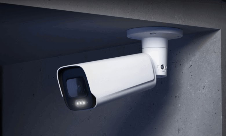 Synology outdoor security camera mounted under exterior overhang providing high-resolution surveillance.