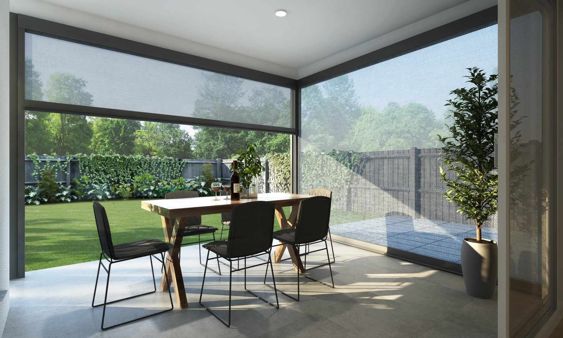 Motorized outdoor shade screens installed on modern patio with dining area in Tacoma, Washington