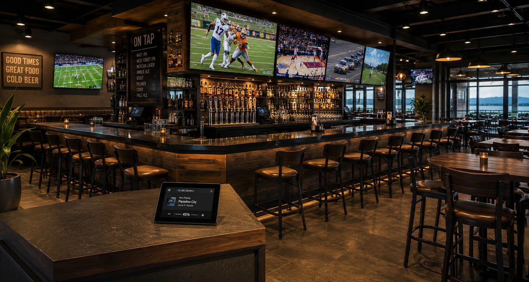Hospitality venue with multiple screens and zoned audio set up for game-day viewing