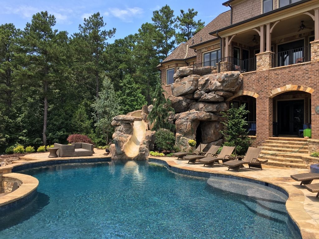 Luxury outdoor pool and living space — landscape audio installation by Rivas Technology Group