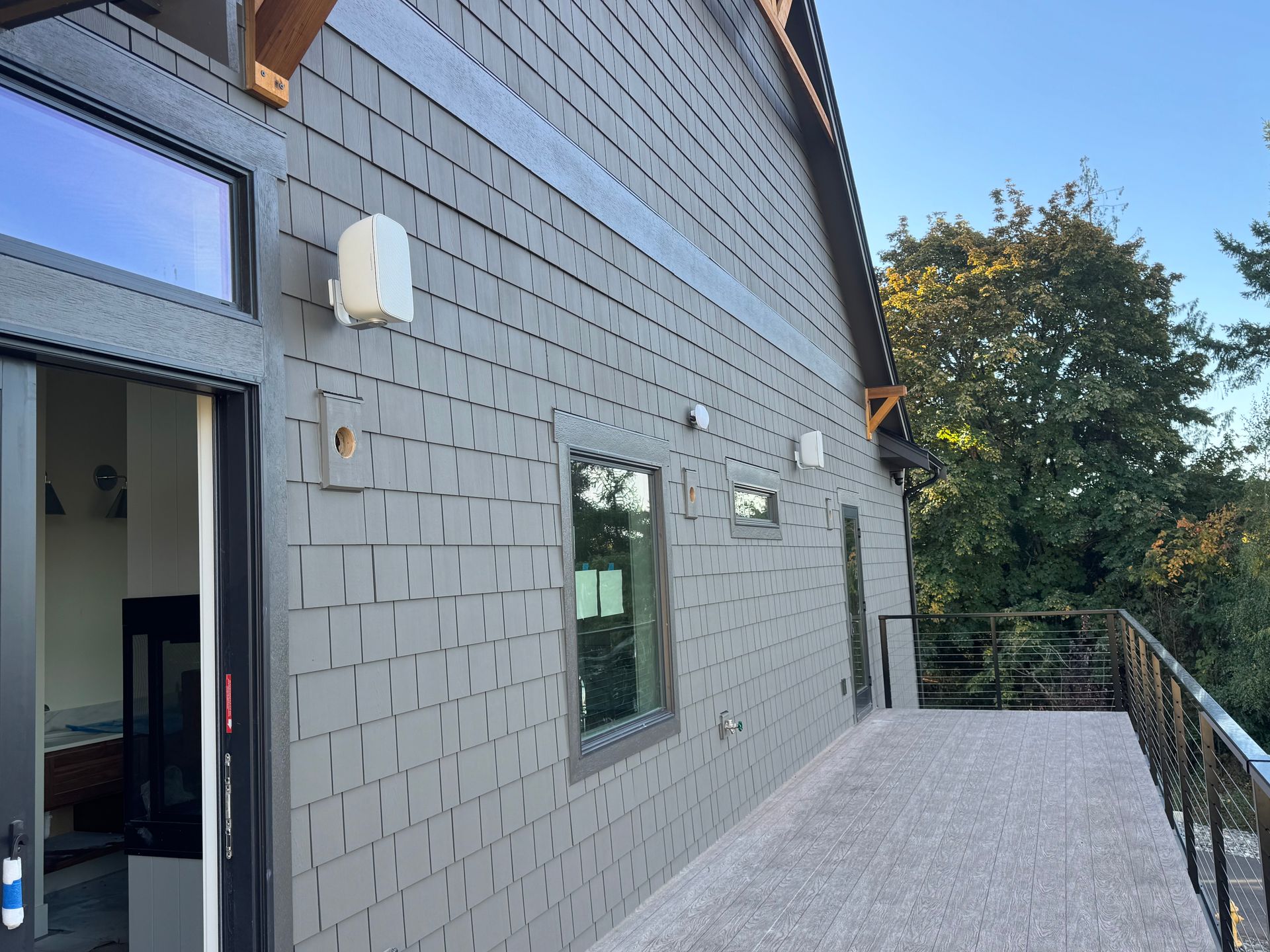 Exterior of Bonney Lake home with white Alta Labs AP6-PRO Outdoor access points before customization.