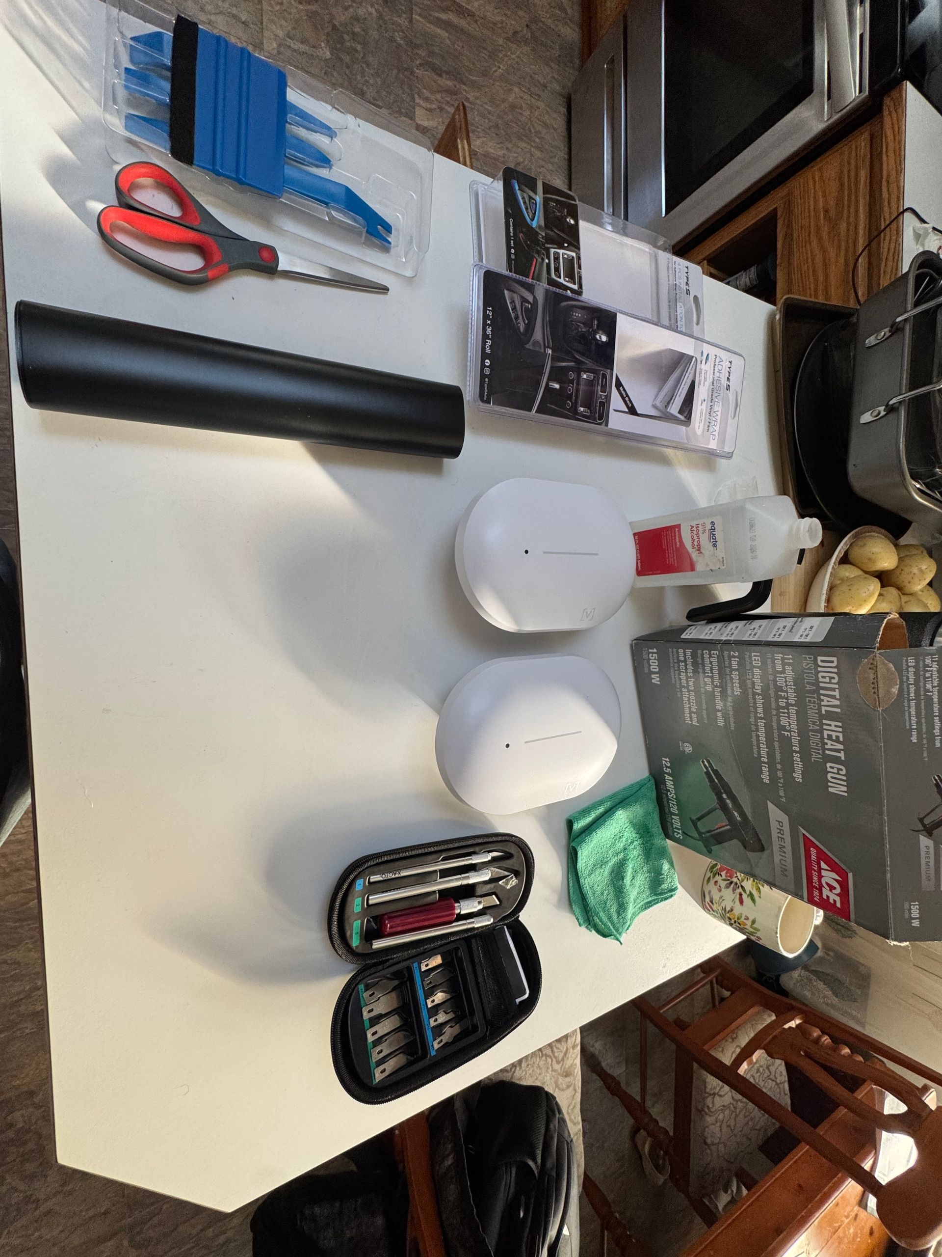 Tools and materials laid out for wrapping Alta Labs AP6-PRO Outdoor access points.