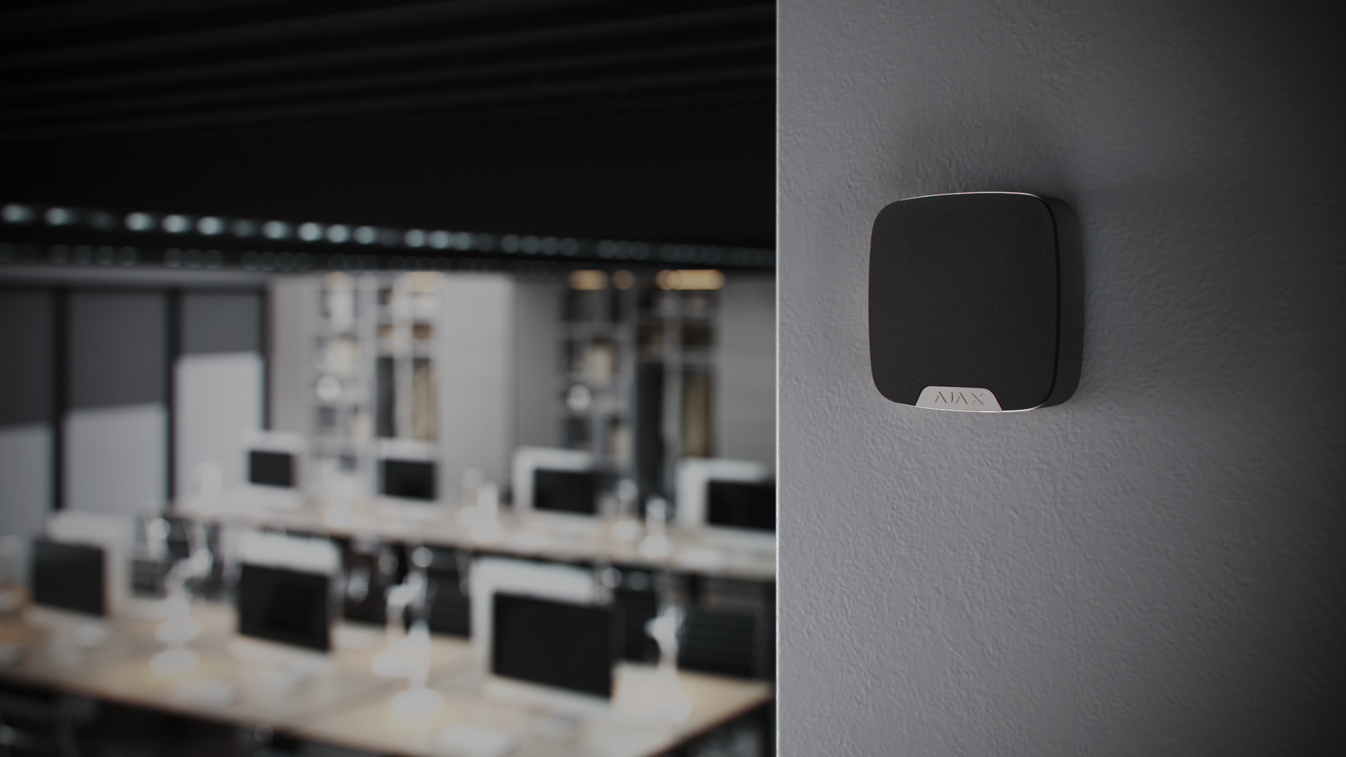 Ajax HomeSiren mounted in a commercial office space, audible alarm device installed by Rivas Technology Group