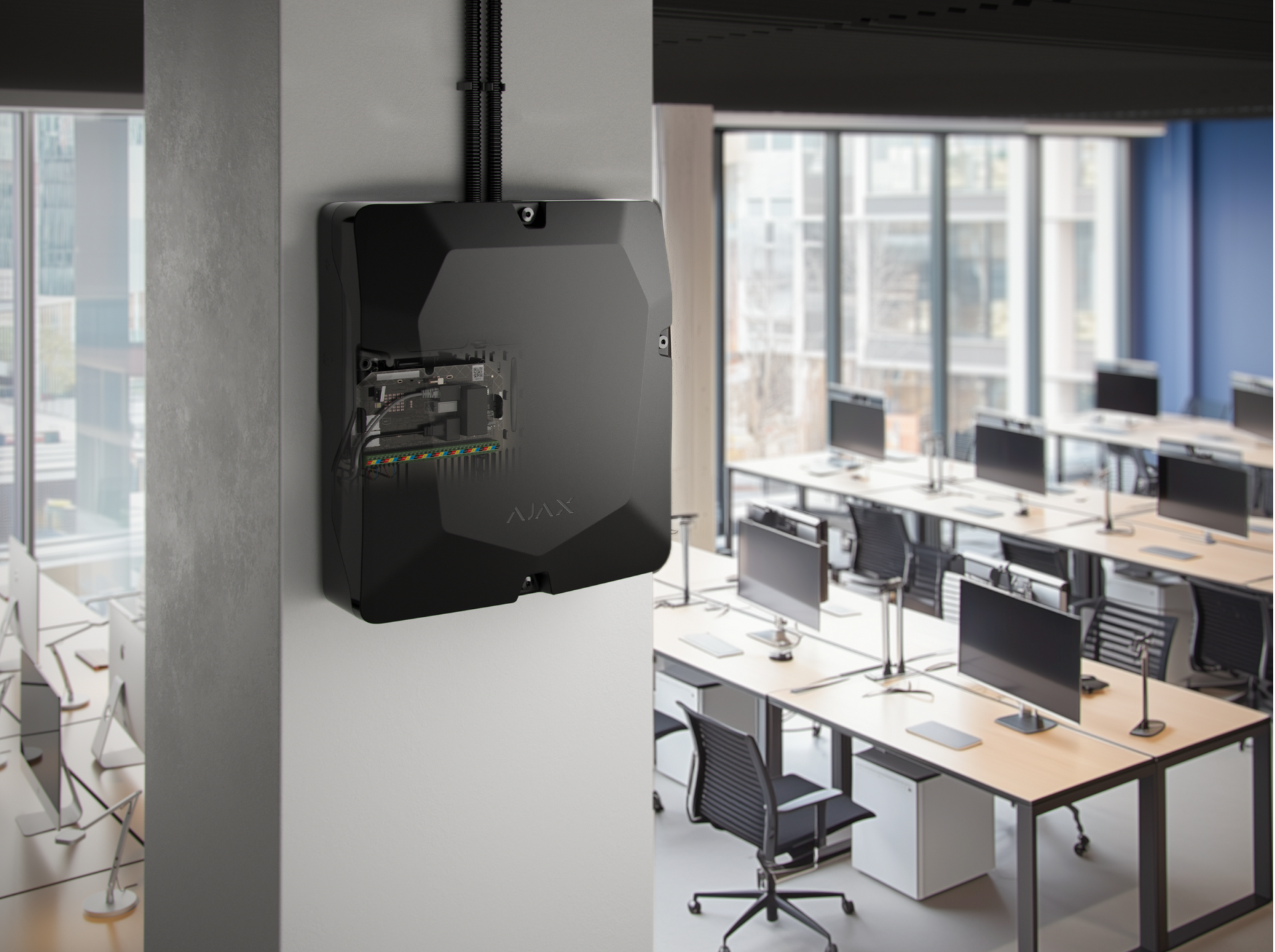 Ajax Hub Hybrid 2 mounted in a commercial office, the control center of a Rivas Technology Group business security system