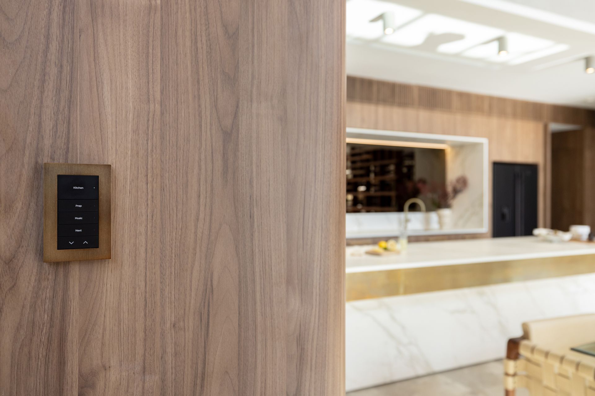 Control4 lighting keypad for custom scene control integrated into modern home design.