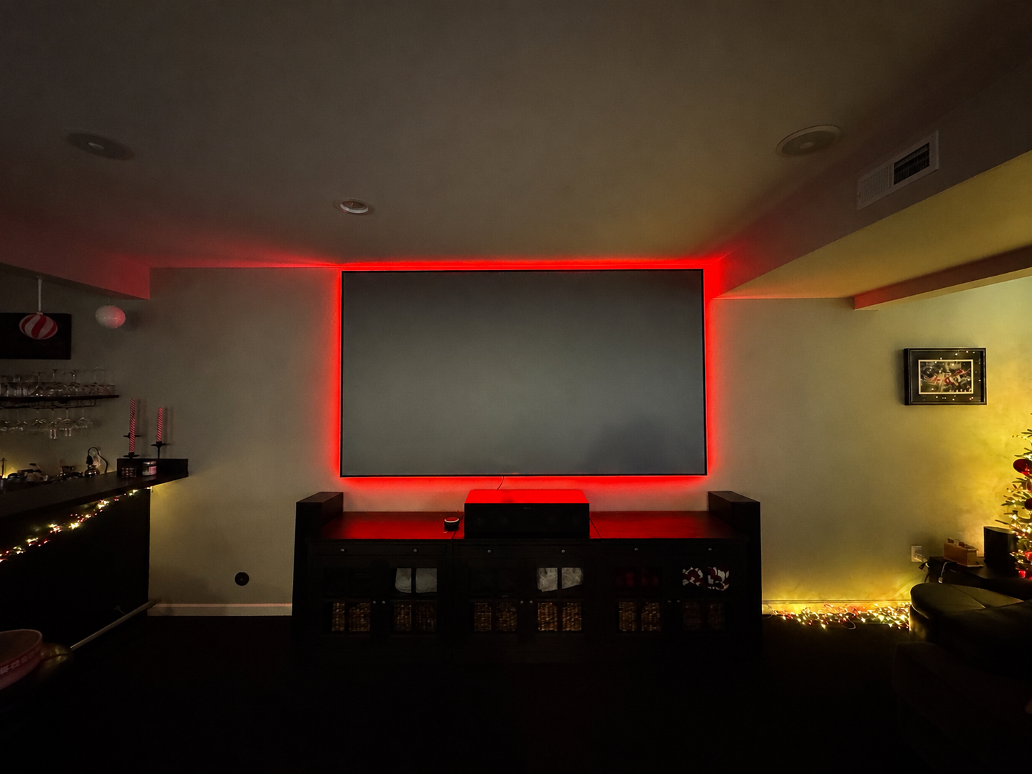 Custom home theater with 120 inch Screen Innovations Black Diamond screen installed by Rivas Technology Group