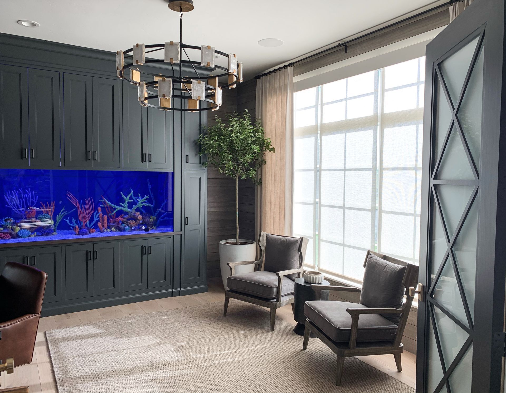 Modern home office in Bonney Lake with floor-to-ceiling windows and motorized PowerShades installed