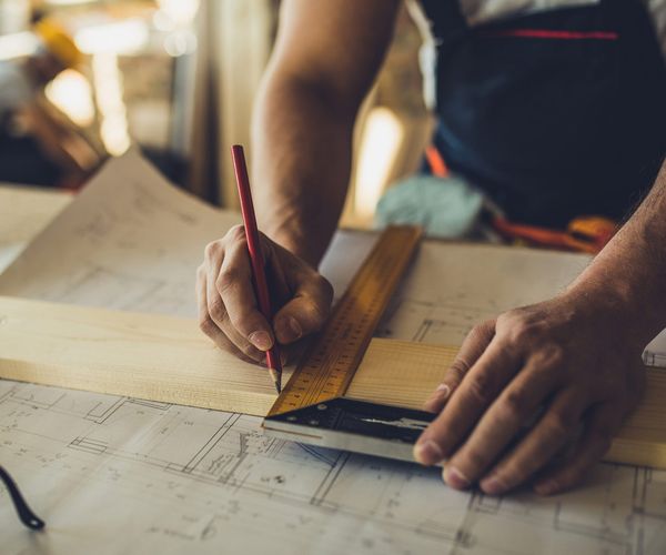 Man Working — Grimes, IA — Top Gun Contractors of Grimes Man Working — Grimes, IA — Top Gun Contractors of Grimes