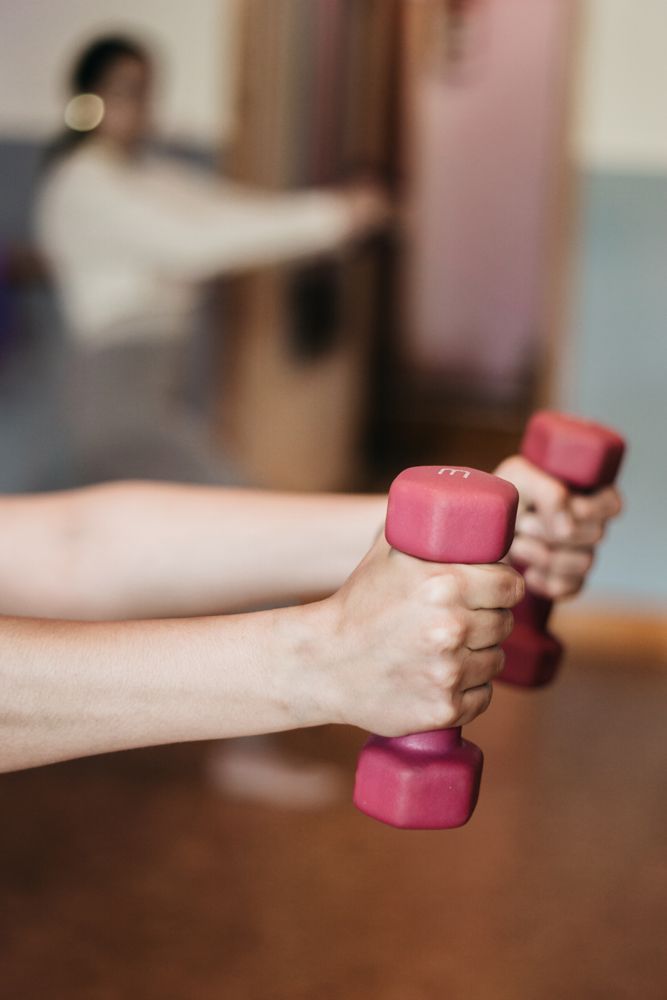Exercising Using Dumbbells — Occupational Therapist in Yeppoon, QLD
