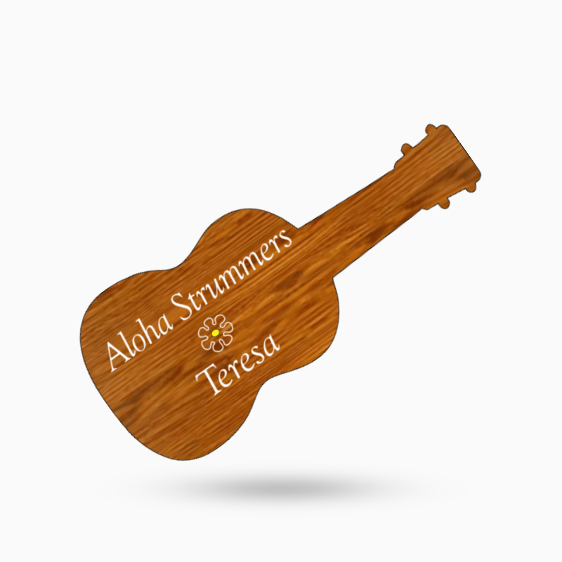 A wooden guitar shaped name tag 