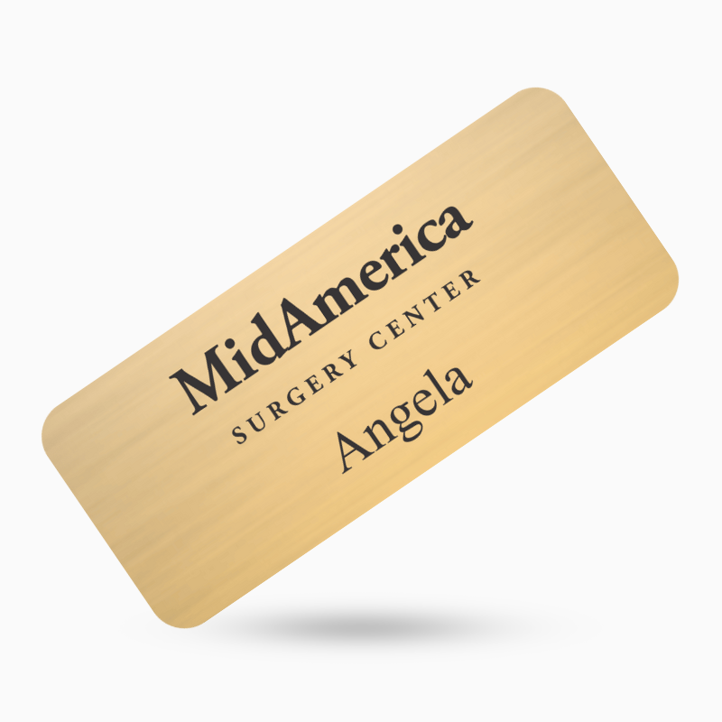 gold colored engraved metal name tag by Name Tag pros
