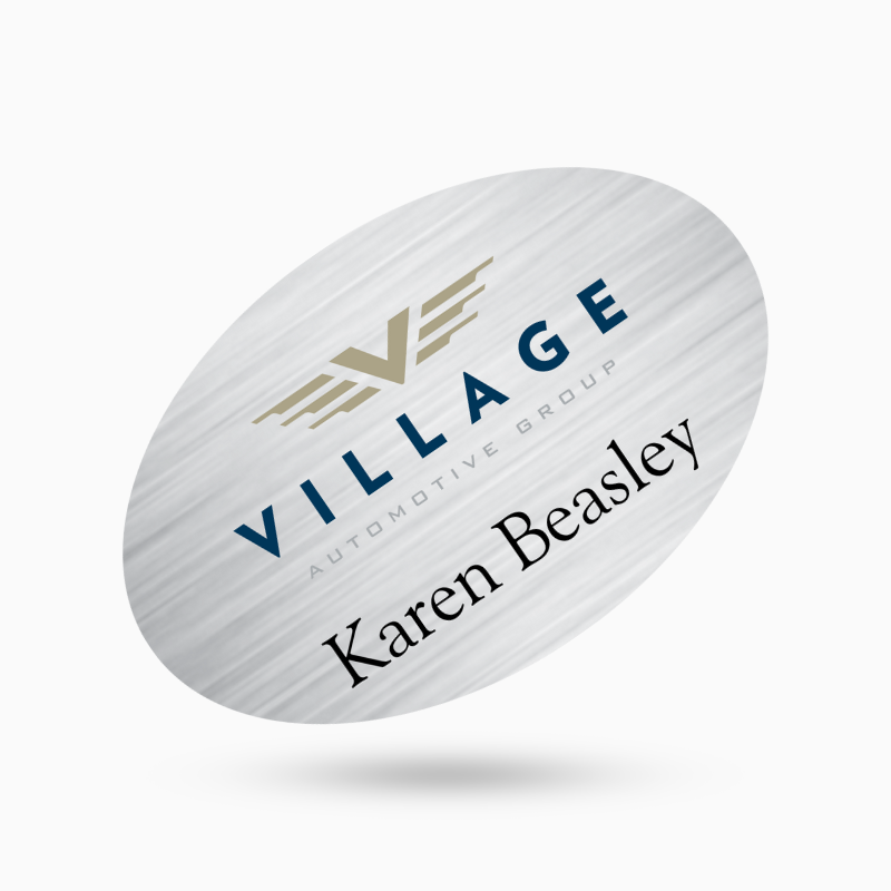 oval shaped metal name tag