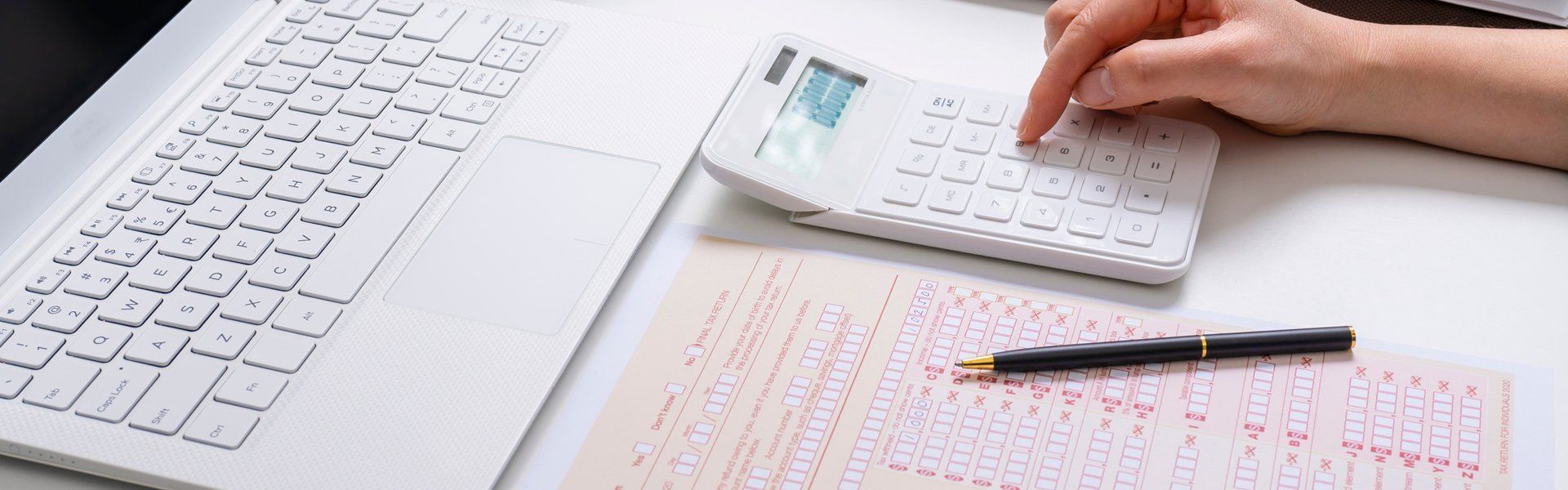 Completing Tax Form — Cardiff, NSW — Lindbeck Partners