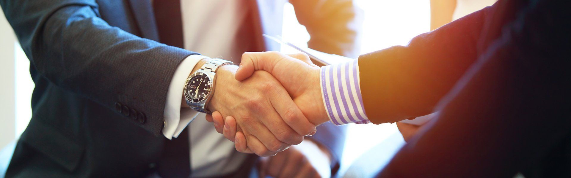 Business People Shaking Hands — Cardiff, NSW — Lindbeck Partners