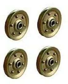 A set of four brass wheels on a white background.