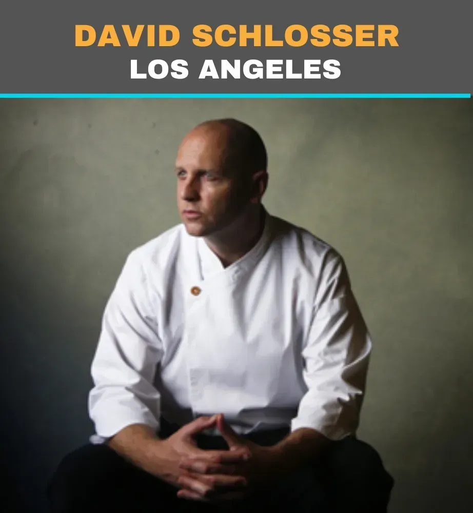 Portrait of David Schlosser in white chef’s coat, seated against a dark studio background with “Los Angeles” text above
