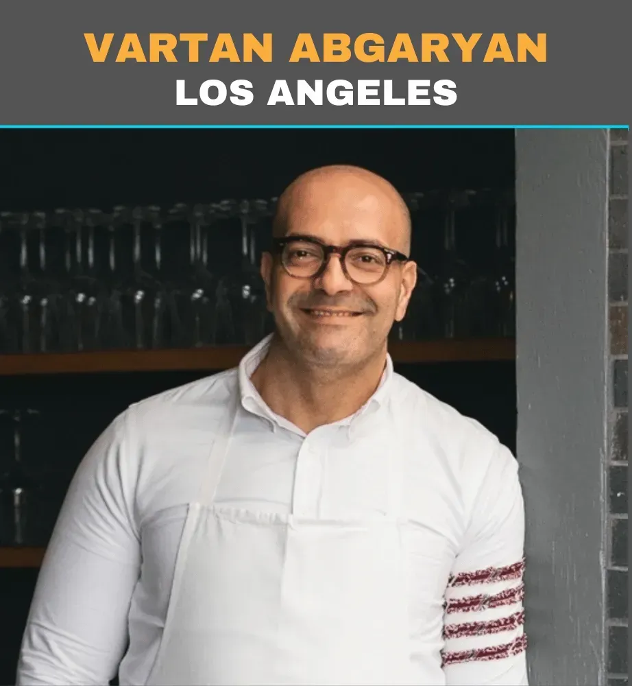Portrait of Vartan Abgaryan in a white chef coat, smiling in a kitchen setting, labeled Los Angeles