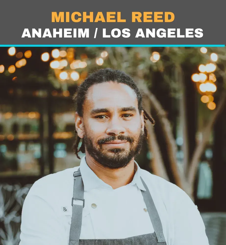 Michael Reed portrait with “Anaheim / Los Angeles” text, standing outdoors with blurred lights in the background