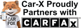 Car-X fox character with phone, partnering with CARFAX, in black and white block text.