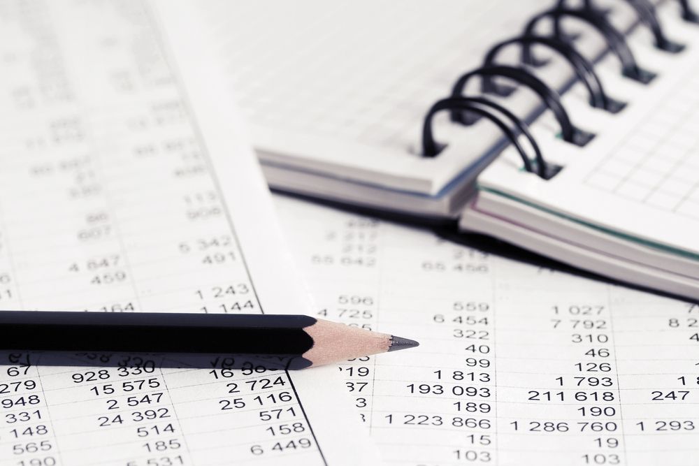 Pencil on Documents With Numbers and a Notepad, Suggesting Financial Analysis or Calculations — Accountsloop Tax & Business Advisory in Geelong, VIC