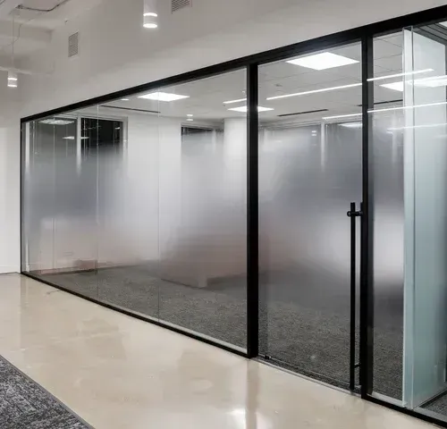 Corporate boardroom glass doors featuring digital screen obscuring film