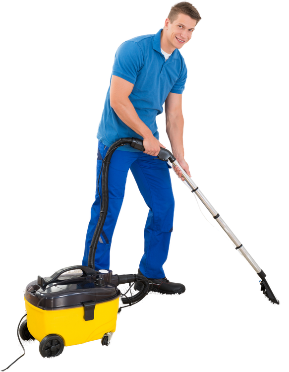 A man in a blue shirt is using a yellow vacuum cleaner.