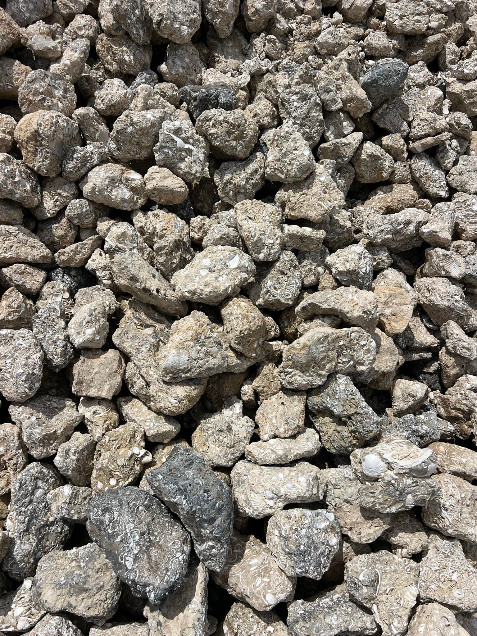 A pile of white rocks sitting on top of each other.