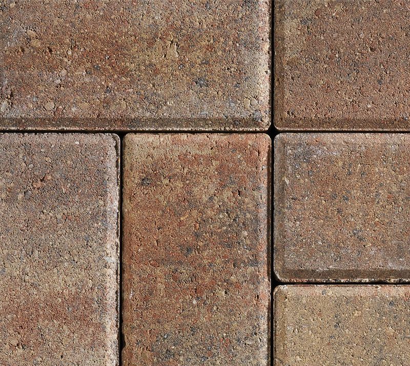A close up of a row of brown bricks