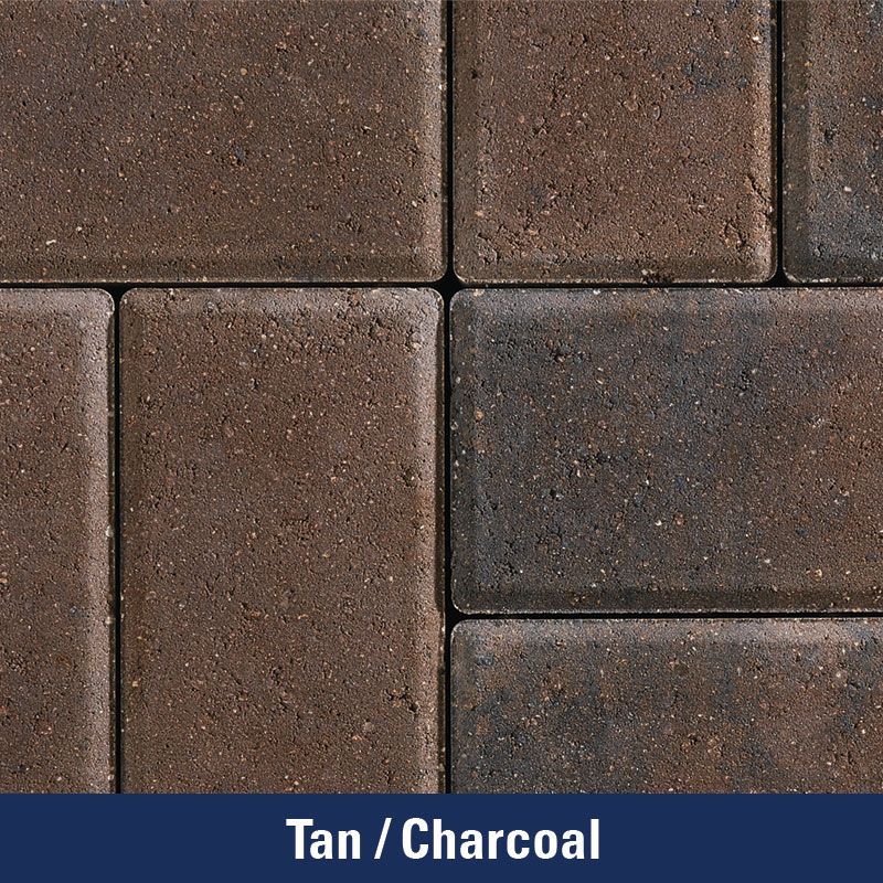 A close up of a tan / charcoal brick