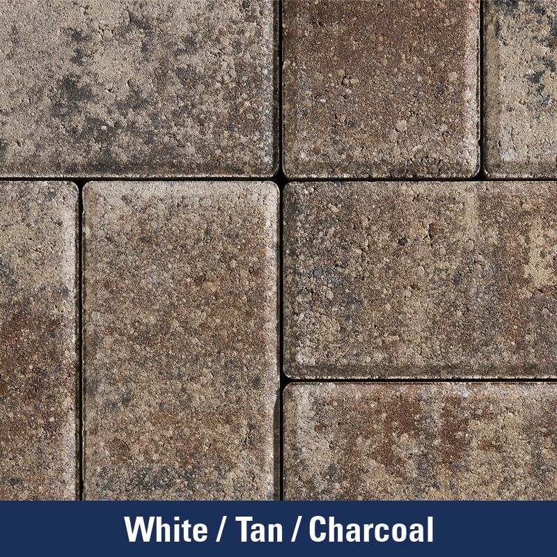 A close up of a white tan and charcoal tile