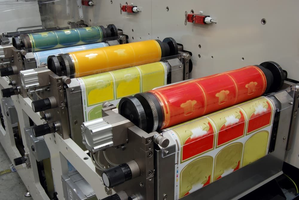 A Machine that Is Printing Stickers on A Roll  — Illawarra Sign Group in Bulli, NSW