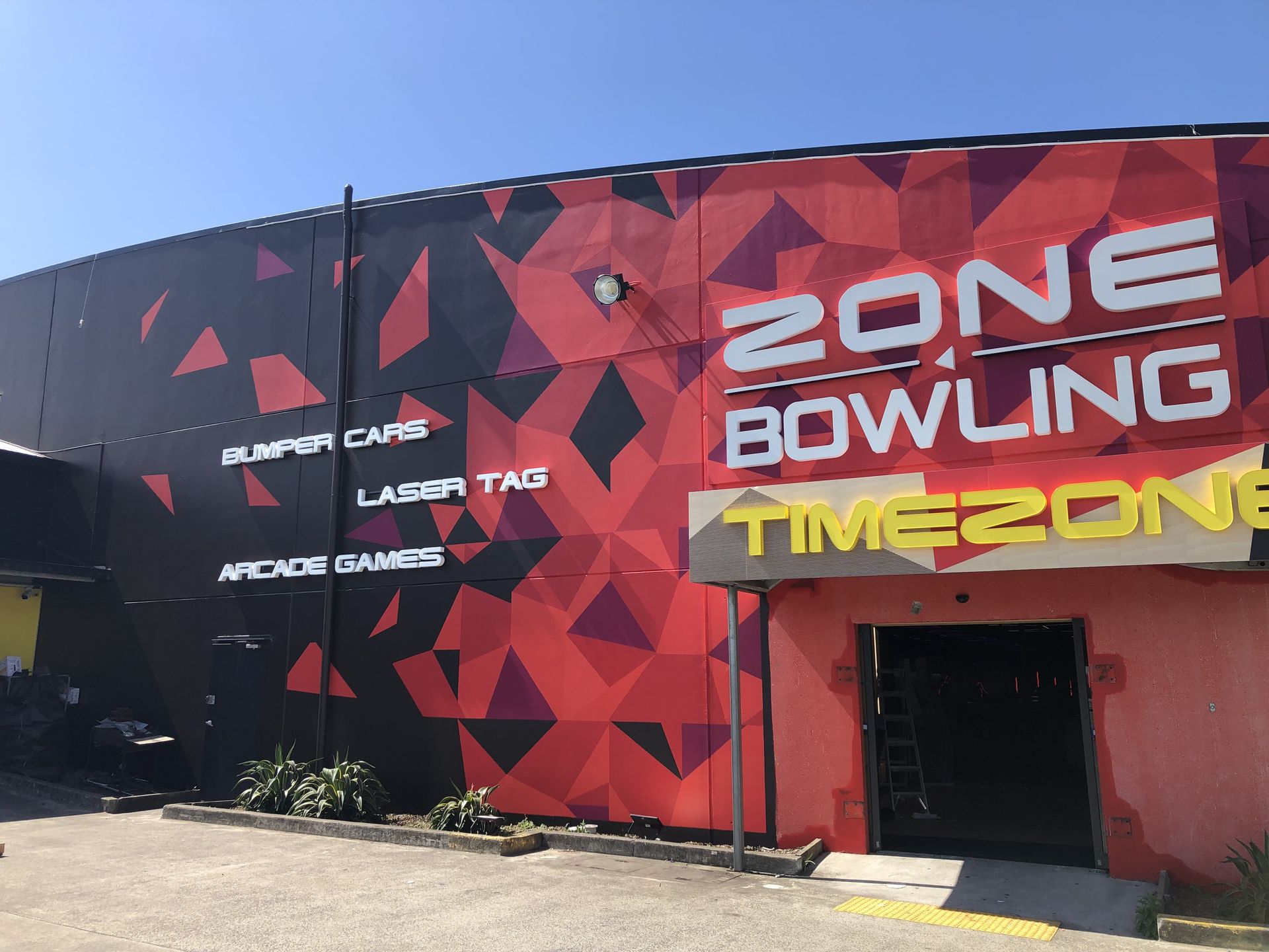 Timezone Shopfront Signs — Illawarra Sign Group in Bulli, NSW