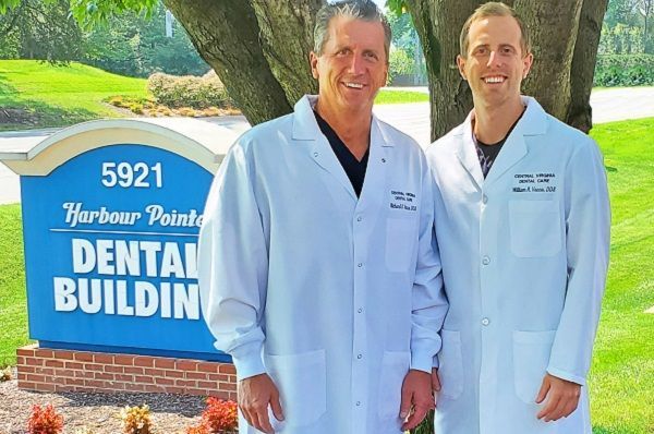 A vacca family dentistry building with a lot of windows