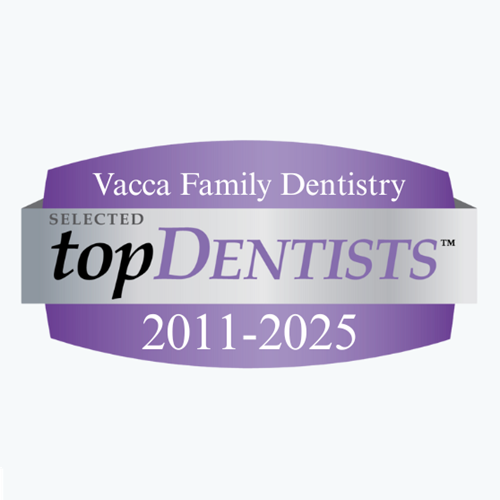 The logo for vacca family dentistry is purple and silver